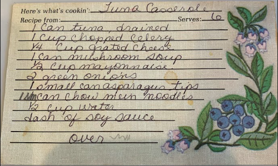 Handwritten recipe card for Grandma's Tuna Casserole with grease stains and handwritten script.